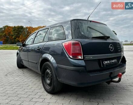 Синій Опель Астра, об'ємом двигуна 1.9 л та пробігом 268 тис. км за 4300 $, фото 5 на Automoto.ua