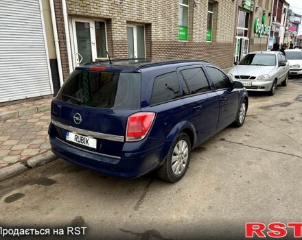 Синий Опель Астра, объемом двигателя 1.9 л и пробегом 320 тыс. км за 5000 $, фото 11 на Automoto.ua