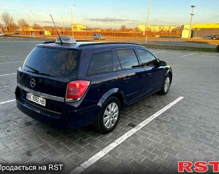 Синий Опель Астра, объемом двигателя 1.9 л и пробегом 320 тыс. км за 5000 $, фото 1 на Automoto.ua