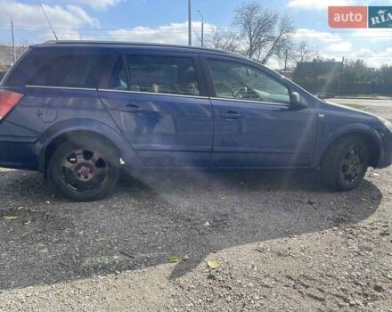 Синий Опель Астра, объемом двигателя 1.2 л и пробегом 338 тыс. км за 3800 $, фото 1 на Automoto.ua