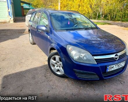 Синий Опель Астра, объемом двигателя 1.2 л и пробегом 330 тыс. км за 4200 $, фото 3 на Automoto.ua