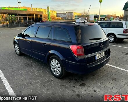 Синий Опель Астра, объемом двигателя 1.9 л и пробегом 320 тыс. км за 5000 $, фото 4 на Automoto.ua