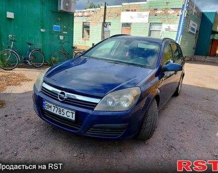 Синий Опель Астра, объемом двигателя 1.2 л и пробегом 330 тыс. км за 4200 $, фото 1 на Automoto.ua