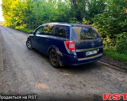 Синий Опель Астра, объемом двигателя 1.2 л и пробегом 370 тыс. км за 4000 $, фото 4 на Automoto.ua