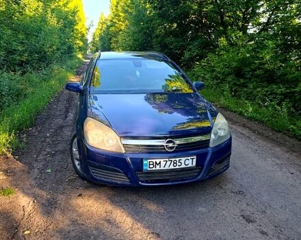 Синий Опель Астра, объемом двигателя 1.2 л и пробегом 370 тыс. км за 4000 $, фото 6 на Automoto.ua