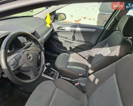 Синий Опель Астра, объемом двигателя 1.69 л и пробегом 235 тыс. км за 4100 $, фото 7 на Automoto.ua