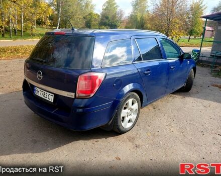 Синий Опель Астра, объемом двигателя 1.2 л и пробегом 330 тыс. км за 4200 $, фото 2 на Automoto.ua