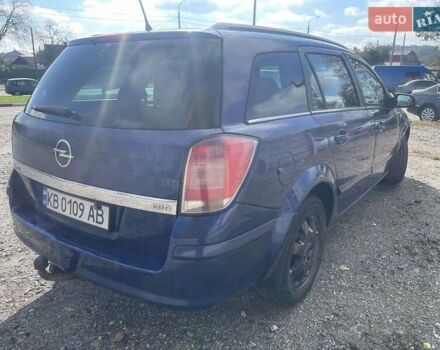 Синий Опель Астра, объемом двигателя 1.2 л и пробегом 338 тыс. км за 3800 $, фото 2 на Automoto.ua