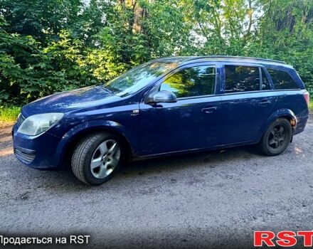 Синий Опель Астра, объемом двигателя 1.2 л и пробегом 370 тыс. км за 4000 $, фото 5 на Automoto.ua