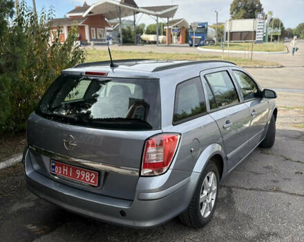 Синий Опель Астра, объемом двигателя 1.6 л и пробегом 240 тыс. км за 5400 $, фото 5 на Automoto.ua