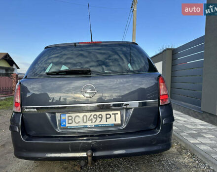 Синий Опель Астра, объемом двигателя 1.9 л и пробегом 260 тыс. км за 5700 $, фото 16 на Automoto.ua