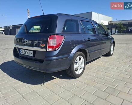 Синий Опель Астра, объемом двигателя 1.6 л и пробегом 194 тыс. км за 6250 $, фото 4 на Automoto.ua