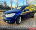 Синий Опель Астра, объемом двигателя 1.7 л и пробегом 318 тыс. км за 5350 $, фото 1 на Automoto.ua