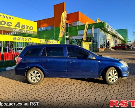 Синий Опель Астра, объемом двигателя 1.7 л и пробегом 318 тыс. км за 5350 $, фото 3 на Automoto.ua