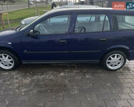 Синий Опель Астра, объемом двигателя 1.69 л и пробегом 300 тыс. км за 3600 $, фото 6 на Automoto.ua