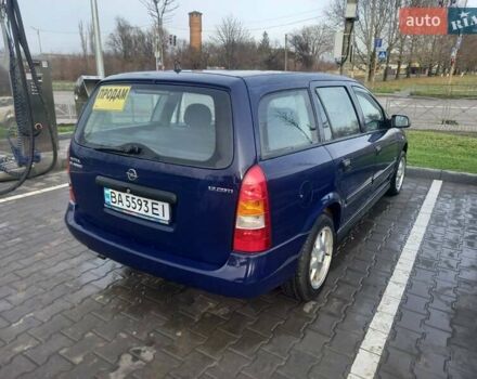 Синий Опель Астра, объемом двигателя 1.69 л и пробегом 300 тыс. км за 3600 $, фото 2 на Automoto.ua