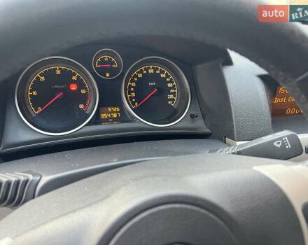 Синий Опель Астра, объемом двигателя 1.69 л и пробегом 354 тыс. км за 5000 $, фото 12 на Automoto.ua