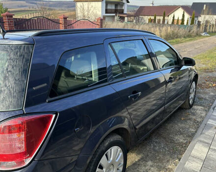 Синий Опель Астра, объемом двигателя 1.9 л и пробегом 260 тыс. км за 5700 $, фото 2 на Automoto.ua