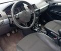 Синий Опель Астра, объемом двигателя 1 л и пробегом 210 тыс. км за 5996 $, фото 4 на Automoto.ua