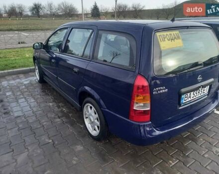 Синий Опель Астра, объемом двигателя 1.69 л и пробегом 300 тыс. км за 3600 $, фото 4 на Automoto.ua