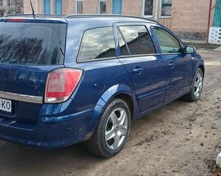 Синий Опель Астра, объемом двигателя 1.7 л и пробегом 288 тыс. км за 4499 $, фото 4 на Automoto.ua