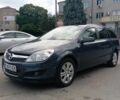Синий Опель Астра, объемом двигателя 1 л и пробегом 210 тыс. км за 5996 $, фото 1 на Automoto.ua