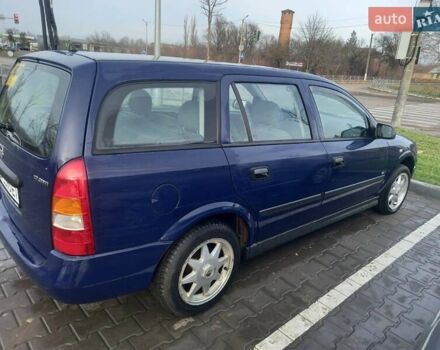 Синий Опель Астра, объемом двигателя 1.69 л и пробегом 300 тыс. км за 3600 $, фото 3 на Automoto.ua