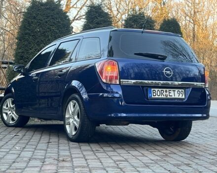 Синий Опель Астра, объемом двигателя 1.7 л и пробегом 235 тыс. км за 5600 $, фото 16 на Automoto.ua