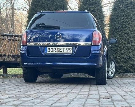 Синий Опель Астра, объемом двигателя 1.7 л и пробегом 235 тыс. км за 5600 $, фото 20 на Automoto.ua
