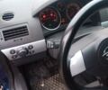 Синий Опель Астра, объемом двигателя 1.7 л и пробегом 244 тыс. км за 4800 $, фото 3 на Automoto.ua