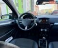 Синий Опель Астра, объемом двигателя 1.8 л и пробегом 185 тыс. км за 7500 $, фото 23 на Automoto.ua