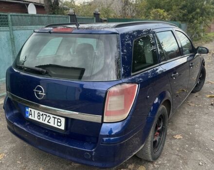 Опель Астра 2009 в Черкассах на Automoto.ua Синий Опель Астра, объемом двигателя 1.7 л и пробегом 240 тыс. км за 5000 $, фото 4 на Automoto.ua