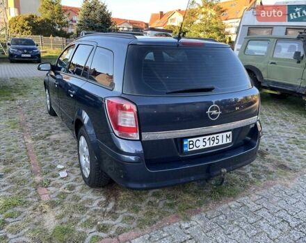 Синий Опель Астра, объемом двигателя 1.7 л и пробегом 238 тыс. км за 5000 $, фото 9 на Automoto.ua
