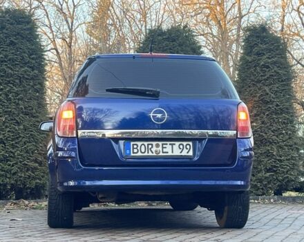 Синий Опель Астра, объемом двигателя 1.7 л и пробегом 235 тыс. км за 5600 $, фото 15 на Automoto.ua