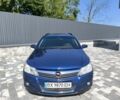 Синий Опель Астра, объемом двигателя 1.4 л и пробегом 229 тыс. км за 4900 $, фото 4 на Automoto.ua