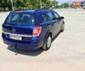 Синий Опель Астра, объемом двигателя 1.7 л и пробегом 250 тыс. км за 6100 $, фото 5 на Automoto.ua