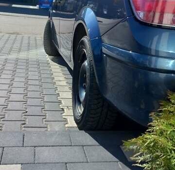 Синий Опель Астра, объемом двигателя 1.36 л и пробегом 214 тыс. км за 5900 $, фото 7 на Automoto.ua