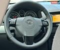 Синий Опель Астра, объемом двигателя 1.8 л и пробегом 175 тыс. км за 6200 $, фото 80 на Automoto.ua