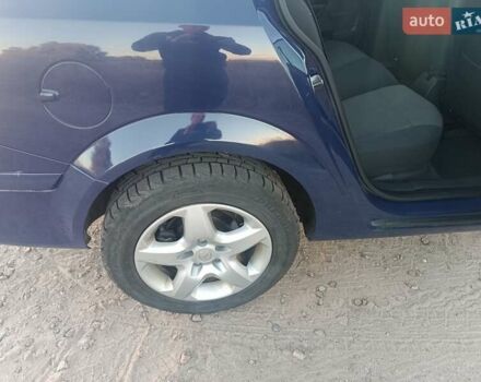 Синий Опель Астра, объемом двигателя 1.7 л и пробегом 251 тыс. км за 6100 $, фото 3 на Automoto.ua