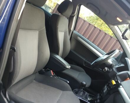 Синий Опель Астра, объемом двигателя 1.7 л и пробегом 275 тыс. км за 5600 $, фото 9 на Automoto.ua