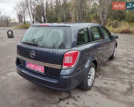 Синий Опель Астра, объемом двигателя 1.6 л и пробегом 230 тыс. км за 5650 $, фото 7 на Automoto.ua
