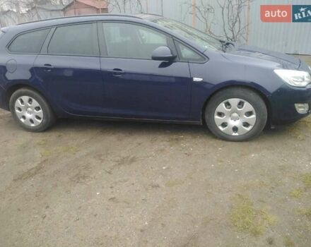 Синій Опель Астра, об'ємом двигуна 1.25 л та пробігом 240 тис. км за 6599 $, фото 2 на Automoto.ua