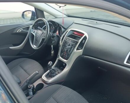 Синий Опель Астра, объемом двигателя 1.4 л и пробегом 180 тыс. км за 1381 $, фото 5 на Automoto.ua