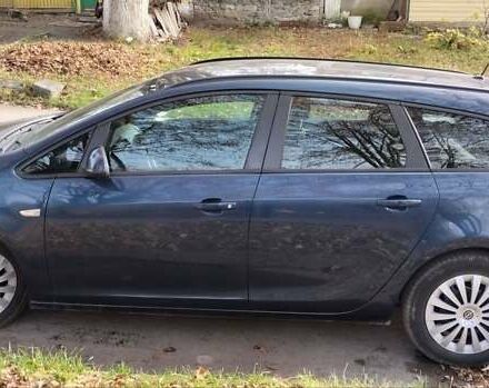 Синій Опель Астра, об'ємом двигуна 1.3 л та пробігом 270 тис. км за 6299 $, фото 4 на Automoto.ua