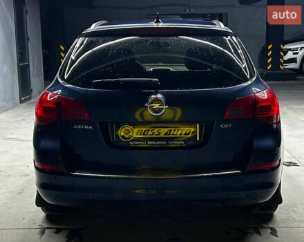 Синий Опель Астра, объемом двигателя 1.69 л и пробегом 231 тыс. км за 7500 $, фото 4 на Automoto.ua