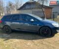 Синий Опель Астра, объемом двигателя 1.25 л и пробегом 230 тыс. км за 5650 $, фото 1 на Automoto.ua