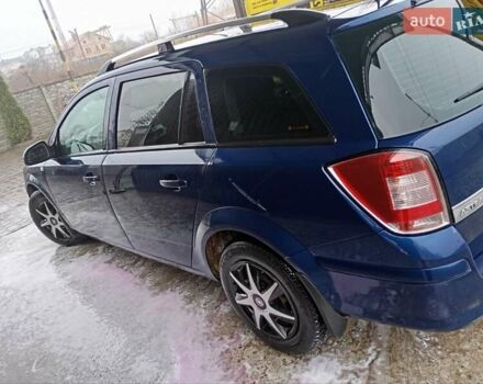 Синий Опель Астра, объемом двигателя 1.7 л и пробегом 245 тыс. км за 5550 $, фото 2 на Automoto.ua
