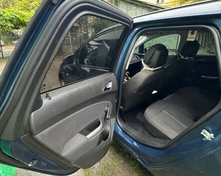 Синий Опель Астра, объемом двигателя 1.7 л и пробегом 231 тыс. км за 7000 $, фото 12 на Automoto.ua