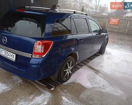Синий Опель Астра, объемом двигателя 1.7 л и пробегом 245 тыс. км за 5550 $, фото 6 на Automoto.ua