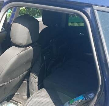 Синий Опель Астра, объемом двигателя 1.3 л и пробегом 248 тыс. км за 6600 $, фото 2 на Automoto.ua